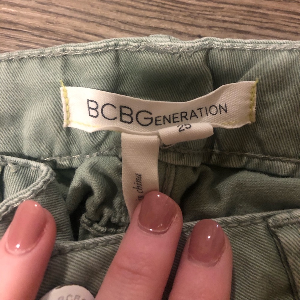 Light army green distressed BCBG cropped jeans